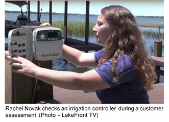 Rachel Novak checking an Irrigation controller 